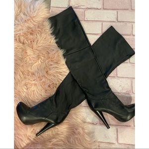 Over the knee high heeled boots